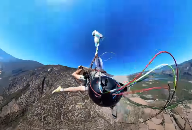 Quiso hacer un truco y se enredó: Paracaidista registró el momento en que se salvó de caer al suelo