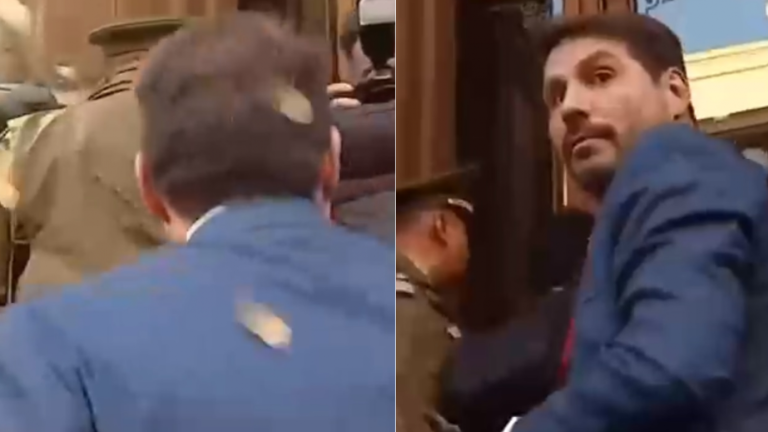 El momento en que le tiran monedas a Pancho Malo antes de reunión por proceso constituyente