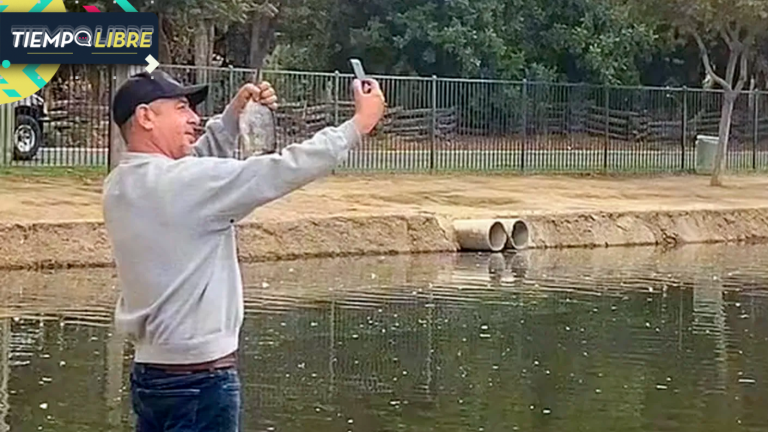Se sacó una foto con un pez y en vez de devolverlo al agua se confundió y tiró su celular