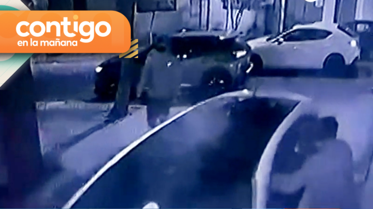 Violento portonazo en Santiago Centro: Delincuentes encañonaron a dueños de vehículo afuera del edificio