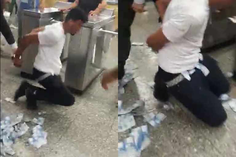 Escondía el dinero en su ropa: Detención dentro del Metro terminó con millones de pesos esparcidos en el suelo